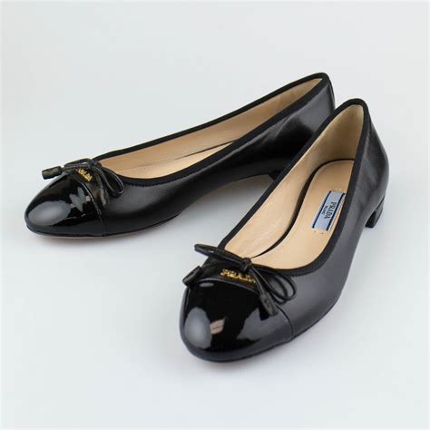 designer black ballet flats.